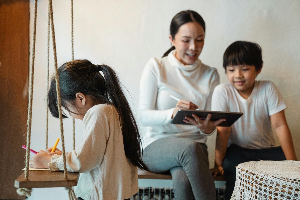 A child learning on a tablet